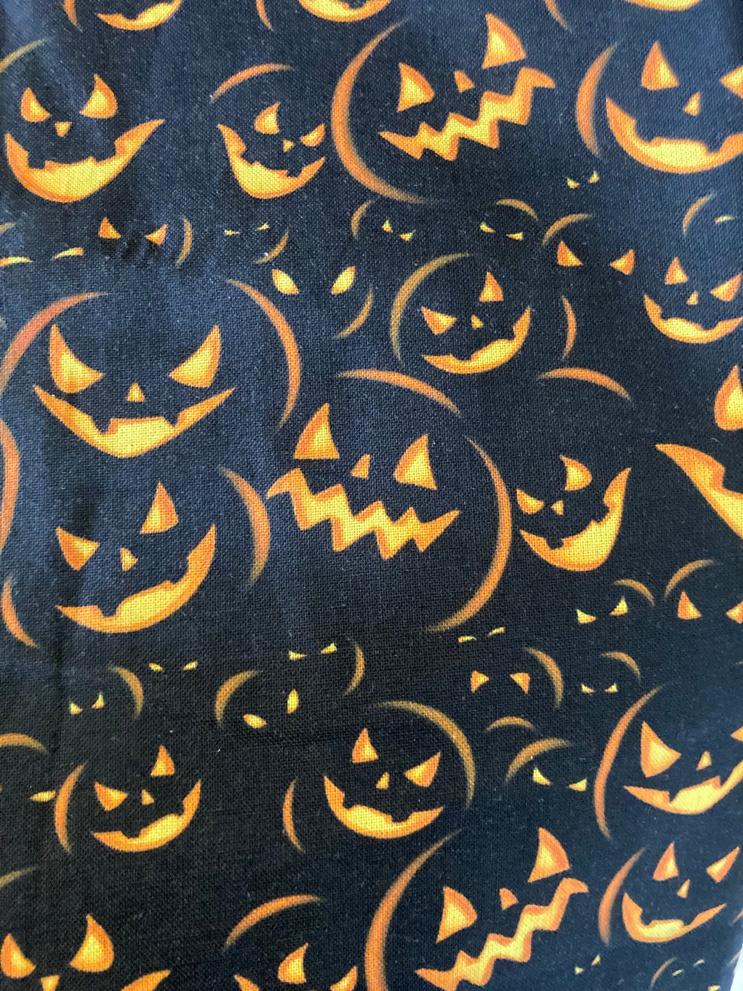 Spooky pumpkin on black scrunchie