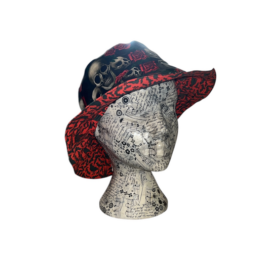 Reversible skull and rose/ crow and bat bucket hat